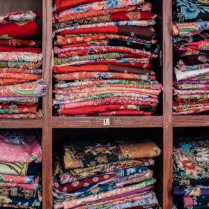 assorted-color cloth on rack